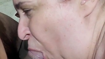 A Plump Middle-Aged Woman Gives Oral Pleasure To A Young Delivery Person