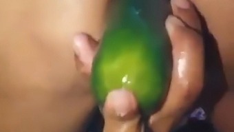 Stepmom Shows Off Her Big Ass While Using A Large Cucumber For Pleasure